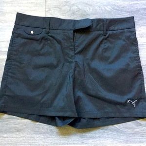 Puma black nylon button and zip up shorts